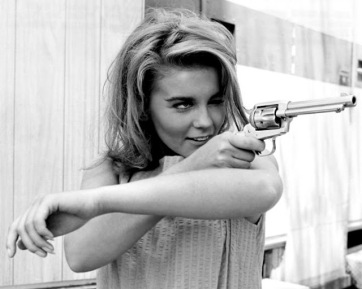 Sweden has prohibitive gun laws, yet native Swede Ann-Margret clealry overcame any fear of handguns--not to mention of recoil!