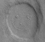Our all-time favorite Martian anomaly is the happy-face photo from Mars's region!